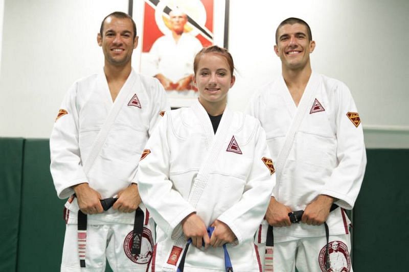 Maycee Barber (centre) with Ryron Gracie (left) and Rener Gracie (right)