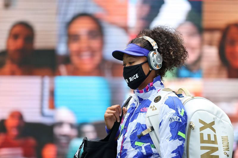 Naomi Osaka walks on to the court wearng a mask at the 2020 US Open