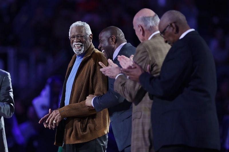 Former NBA players Bill Russell (L) and Earvin &quot;Magic&quot; Johnson Jr. react as they are honored during the 2017 NBA All-Star Game.
