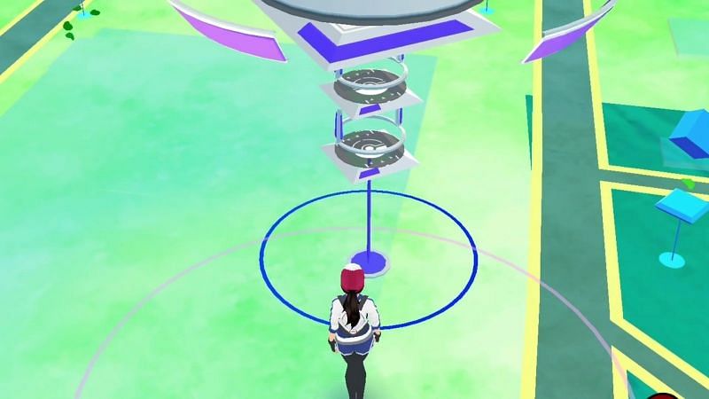 A trainer approaching a Pokemon GO Gym. (Image via Niantic)