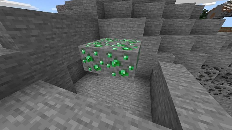 Emerald ore vein with four ores (Image via Minecraft)