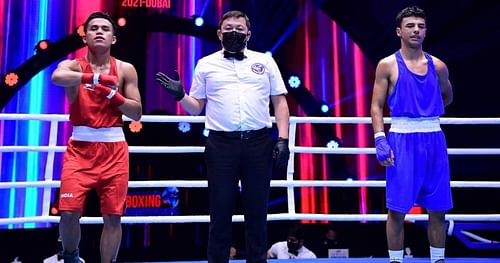 Bishwamitra Chongtham (51 kg) celebrates after his semi-final win.