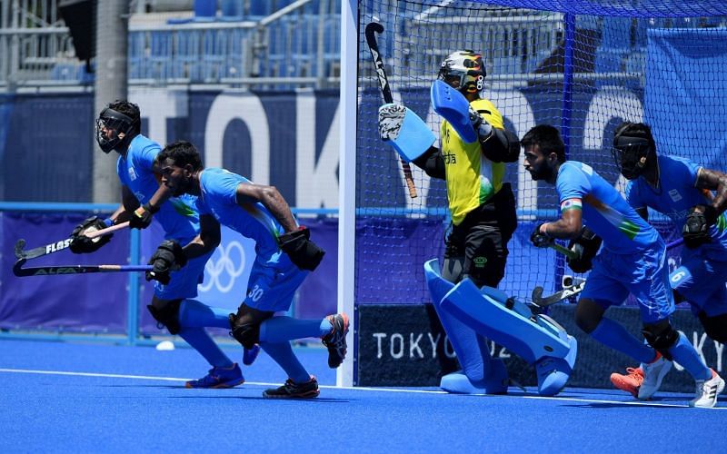 Amit Rohidas rushing in straight into the drag-flicker (Image - Hockey India)