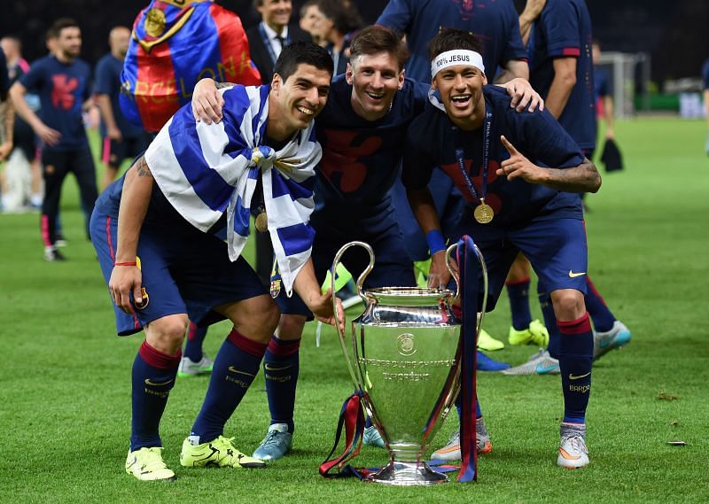 Suarez (L), Messi and Neymar (R) with the UCL trophy in 2015