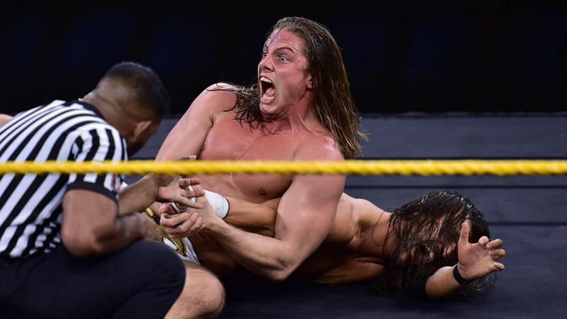 Riddle and Adam Cole from their match  NXT