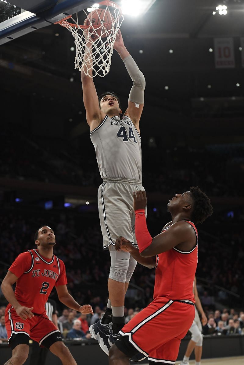 Omer Yurtseven #44 of the Georgetown Hoyas dunks