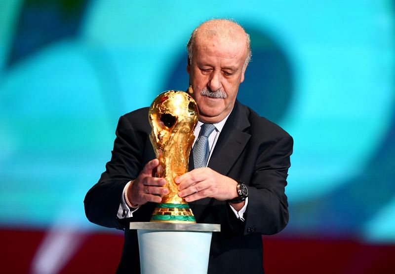 Vicente del Bosque presenting the World Cup trophy.