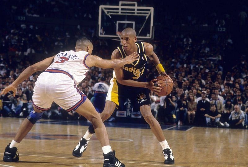 Reggie Miller (right) is guarded by John Starks [Photo by Focus on Sport/Getty Images]