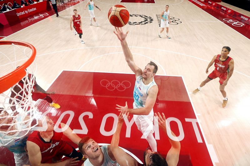 Zoran Dragic #30 drives to the basket against Team Germany