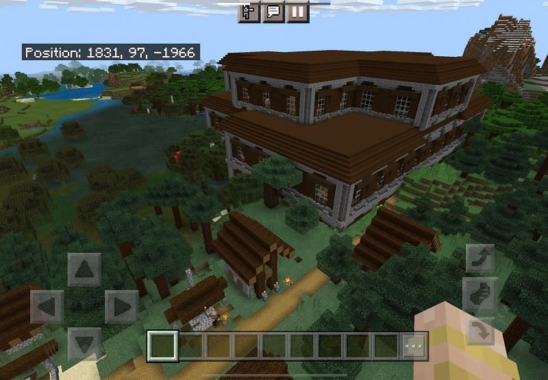 Woodland mansion in a village (Image via Minecraft)