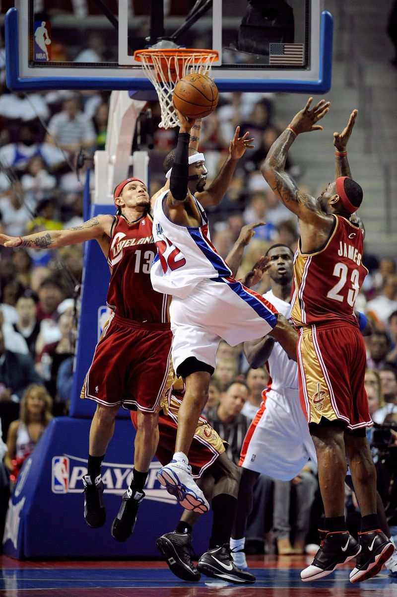 Lebron James and Delonte West defend against Richard Hamilton #32 of the Detroit Pistons