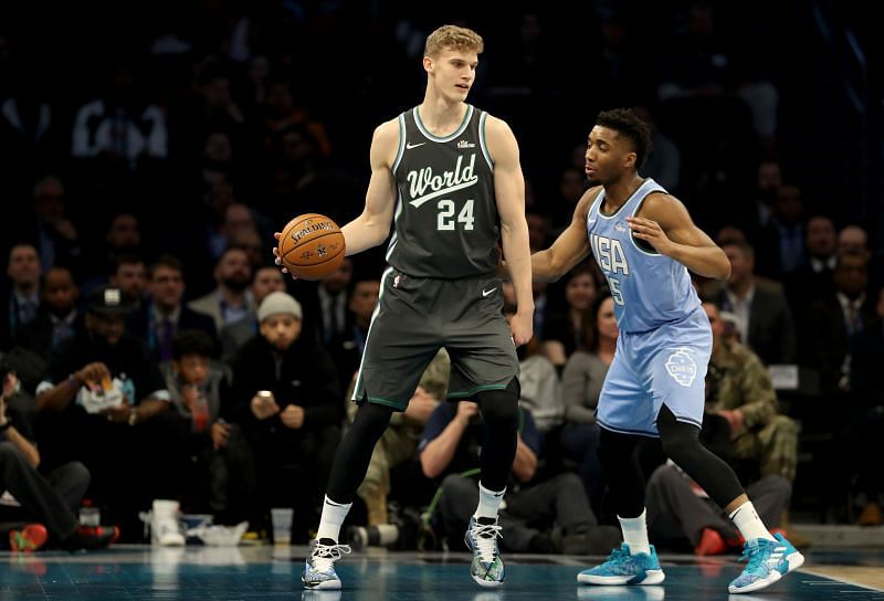 Lauri Markkanen (left) in action during a game