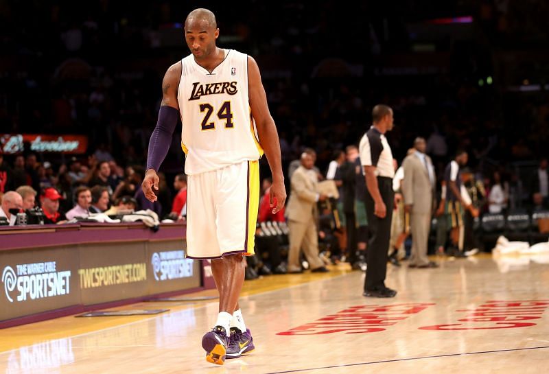 Kobe Bryant (#24) walks off the court