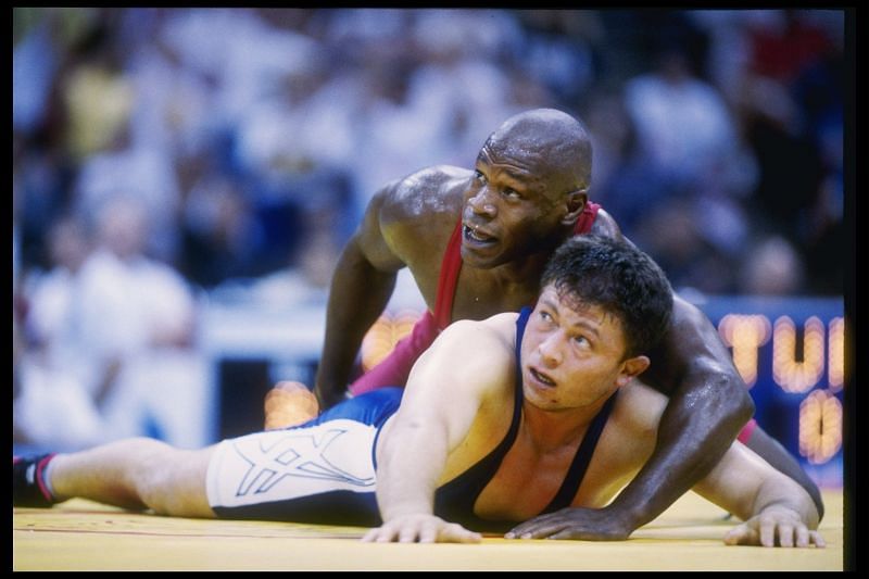 Kevin Jackson pins his opponent.