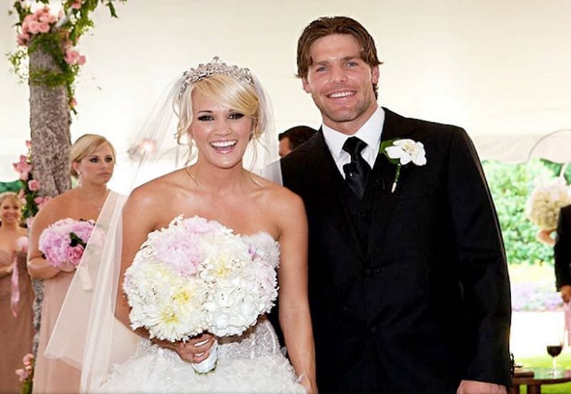 Carrie Underwood with husband, Mike Fisher. (Image via Twitter/DTRCountry)