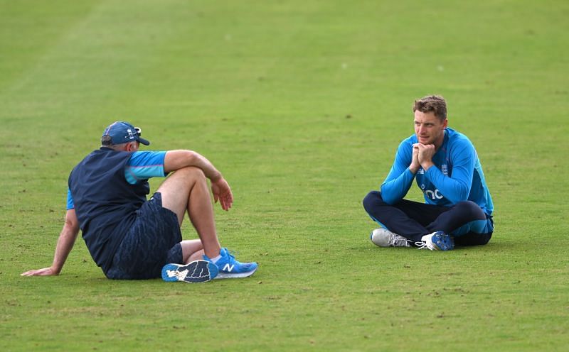 Jos Buttler in conversation with England coach Chris Silverwood at a nets session ahead of the first Test