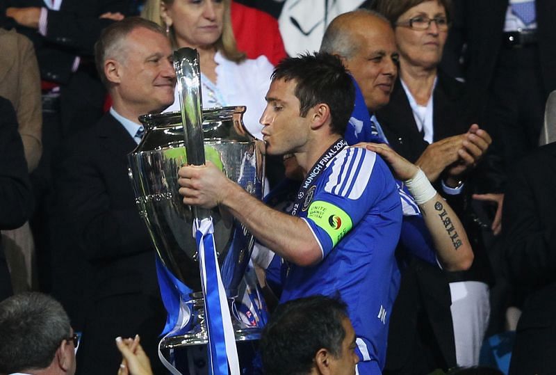 Frank Lampard lifting the Champions League trophy