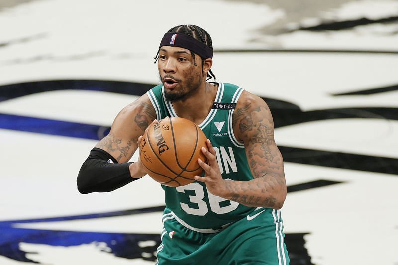 Marcus Smart #36 looks to pass during a playoff game