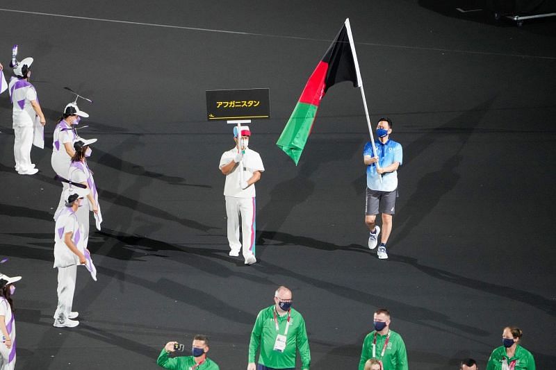 Afghanistan&#039;s flag being carried to the middle as a &#039;mark of solidarity&#039;