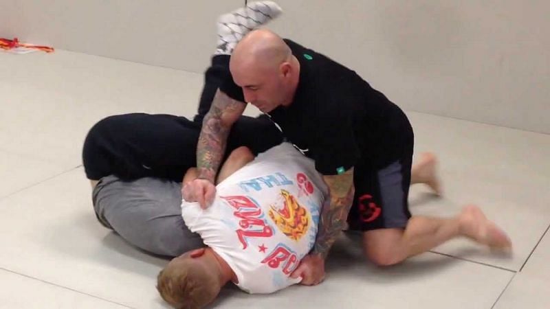 Joe Rogan teaches D&#039;arce choke to TJ Dillashaw &amp; Danny Castillo | Image via YouTube @Onnit