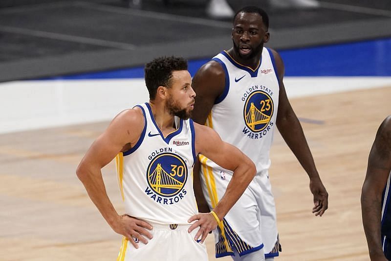 Stephen Curry (left) of the Golden State Warriors against the Dallas Mavericks