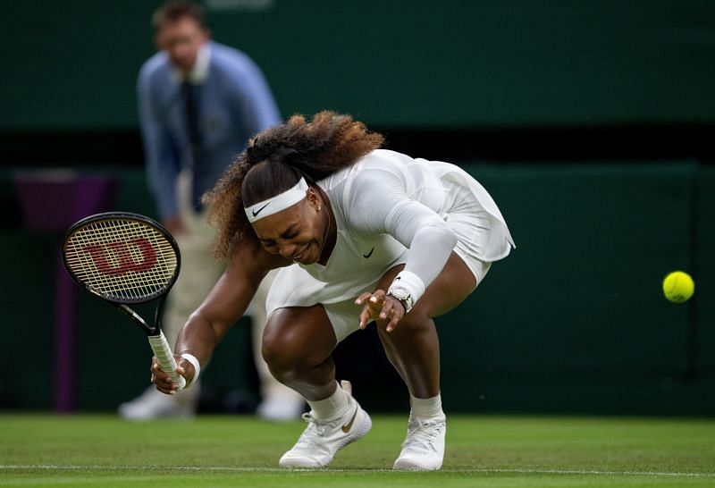Serena Williams winces in pain during her first-round match at Wimbledon