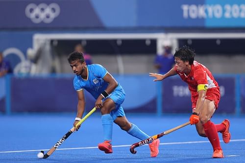 India's Vivek Sagar Prasad in action against Japan at the Tokyo Olympics 2021.