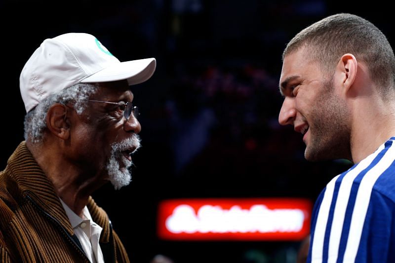 Bill Russell (left) talking to Brook Lopez (right)