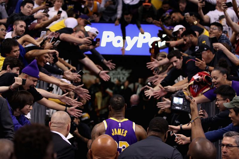 Fans try to reach for LeBron James