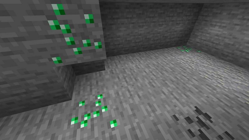 Three emerald ores in one frame (Image via Minecraft)