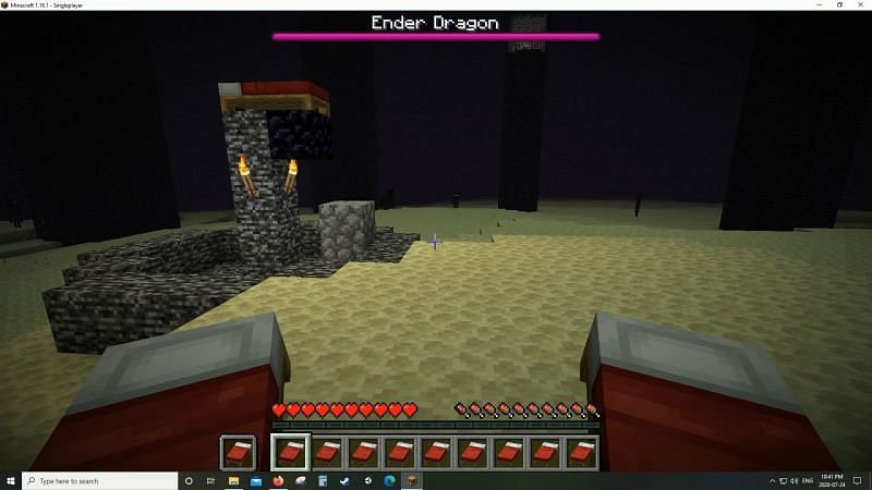 Taking out the Ender Dragon with beds (Image via Minecraft)