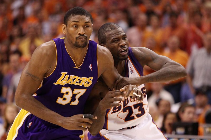 Jason Richardson (#23) fights for position with Ron Artest (#37).