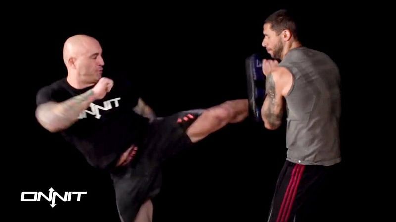 Joe Rogan demonstrates a roundhouse kick | Image via YouTube @Onnit