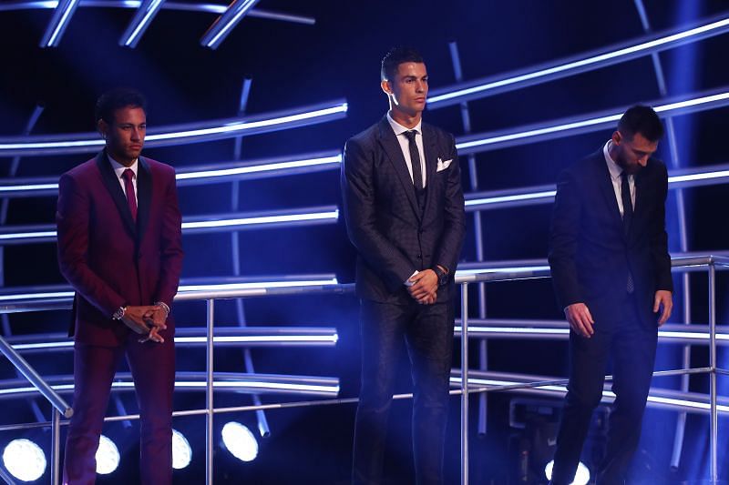 Cristiano Ronaldo (center) and Lionel Messi (right) at The Best FIFA Football Awards show in 2017