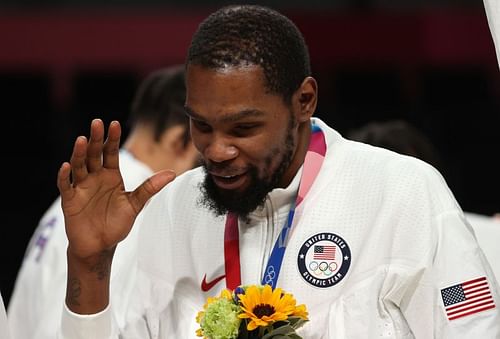 Kevin Durant of Team United States celebrates during the Men's Basketball medal ceremony on day fifteen of the Tokyo 2020 Olympics.