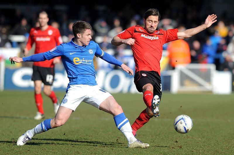 Peterborough United host Cardiff City on Tuesday