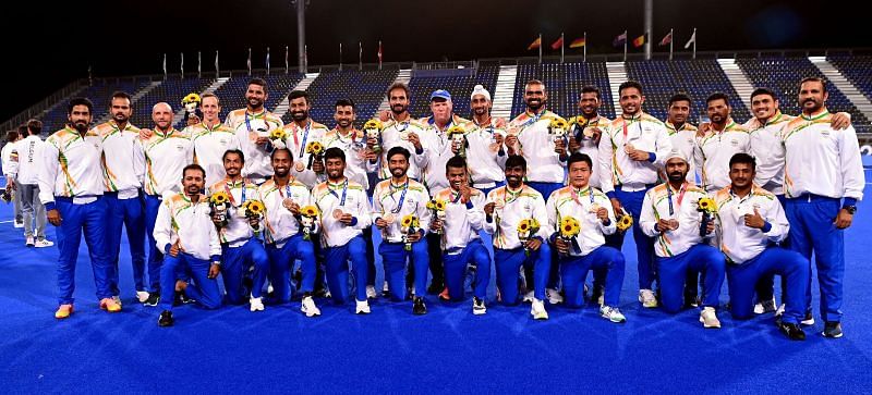 Indian men&#039;s hockey team with the bronze medal (PC: Hockey India)