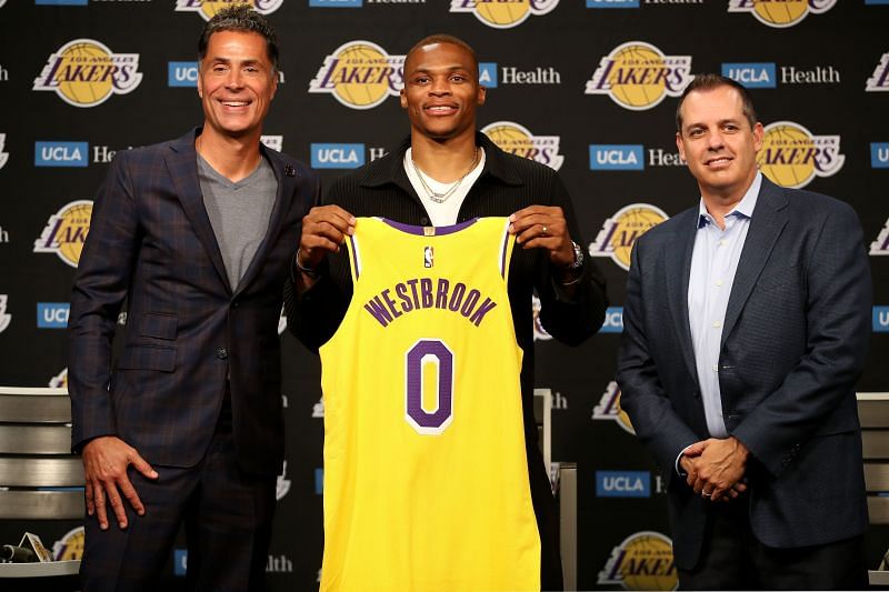 General manager Rob Pelinka, Russell Westbrook #0 and head coach Frank Vogel pose for a picture.