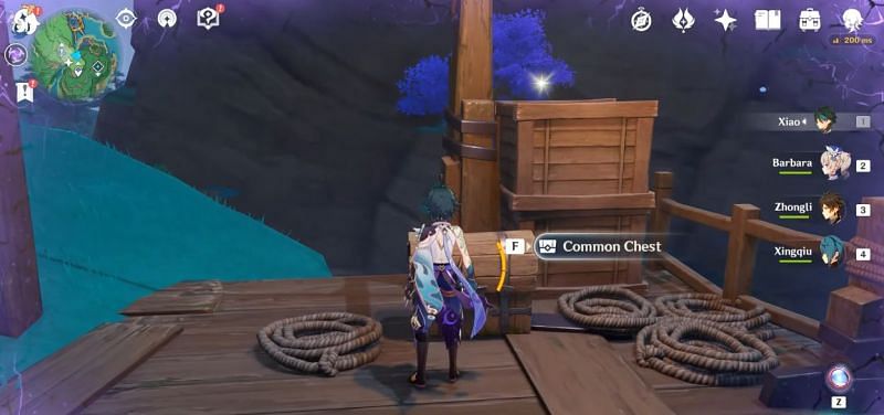 The second key beside boxes and ropes (Image via WoW Quests, Youtube)