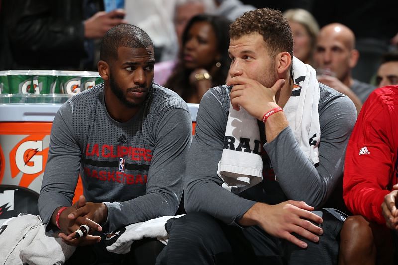Chris Paul #3 and Blake Griffin #32 of the Los Angeles Clippers look on from the bench