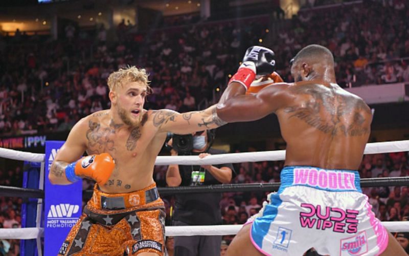 Jake Paul (left) and Tyron Woodley (right)