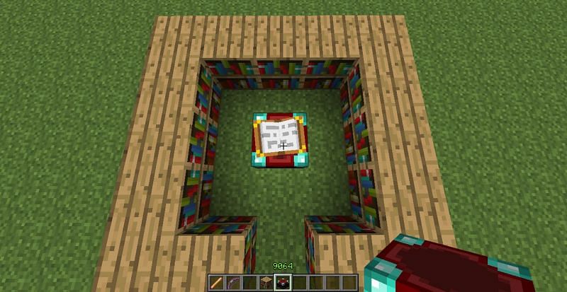 Enchanting table with the 15 bookshelves placed around them (Image via Minecraft)