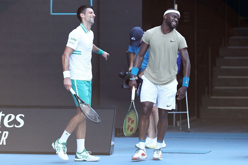 Novak Djokovic (L) and Frances Tiafoe