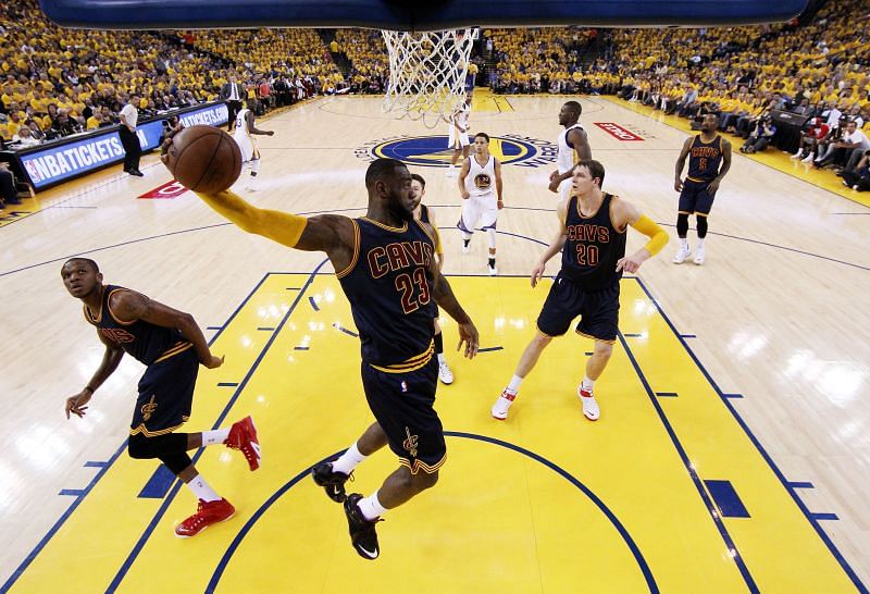 LeBron James #23 of the Cleveland Cavaliers rebounds against the Golden State Warriors in the first half during Game Two of the 2015 NBA Finals at ORACLE Arena on June 7, 2015 in Oakland, California.