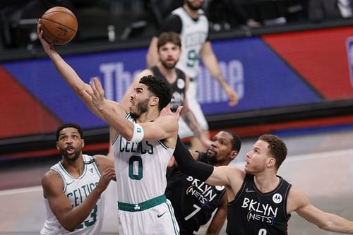 Boston Celtics All-Star (#0) Jayson Tatum going up for a layup