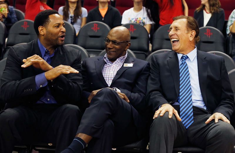 Former Houston Rockets Robert Horry and Clyde Drexler share a laugh with former coach Rudy Tomjanovich as the team honors the 20th anniversary of back-to-back championships in 2015.