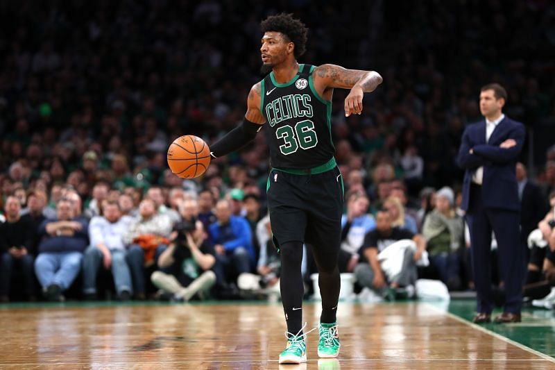 Marcus Smart brings the ball for the Boston Celtics.