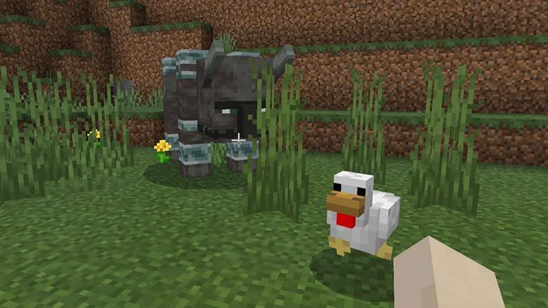 A ravager and a chicken (Image via Minecraft)