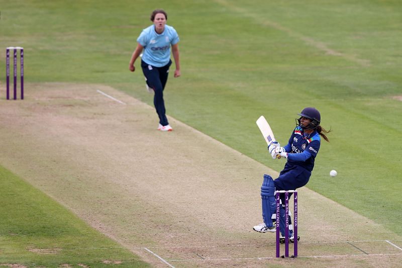 Mithali (R) has been bogged down in the middle overs