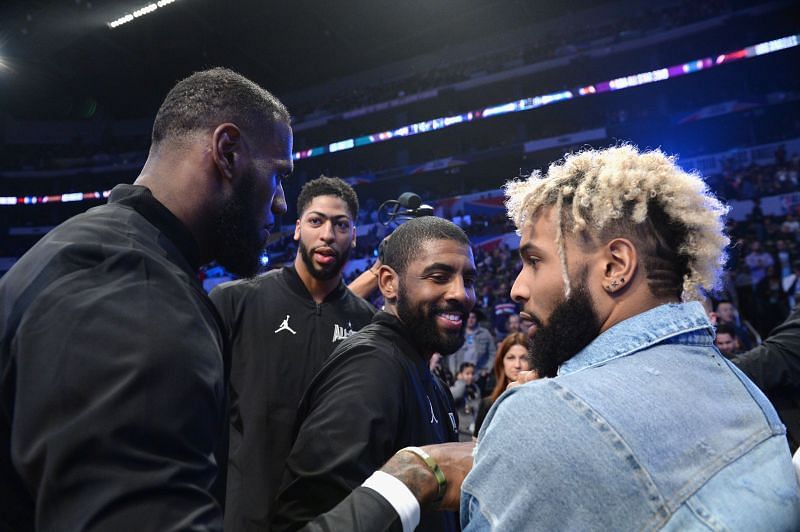Odell Beckham Jr. greets Anthony Davis, Lebron James and Kyrie Irving at the NBA All-Star Game 2018 at Staples Center